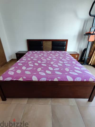 king size bed with two side drawers and medicated mattress.