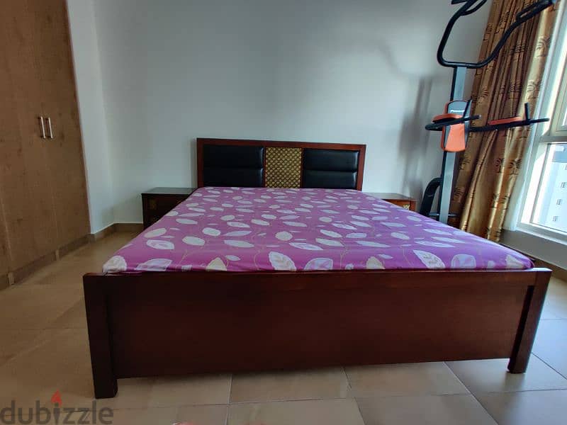 king size bed with two side drawers and medicated mattress. 3