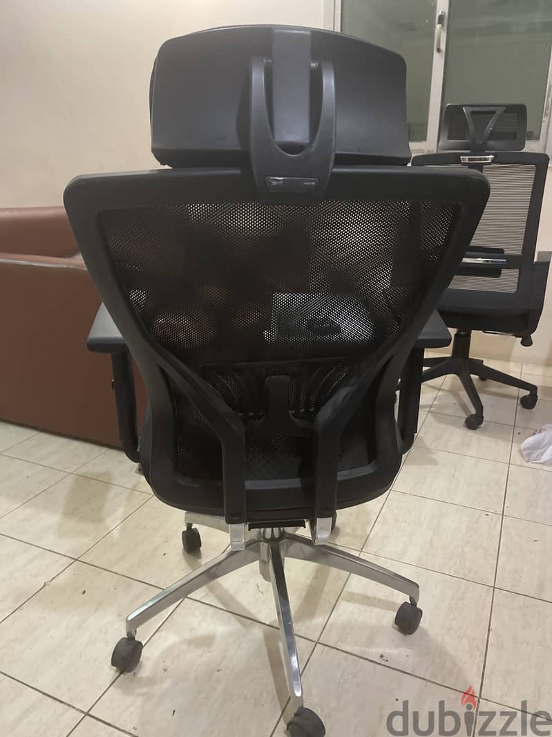 Office rolling chair and 1 monitor 1