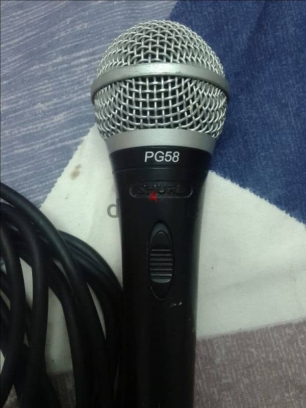 shure pg58 vocal microphone with cable . 1