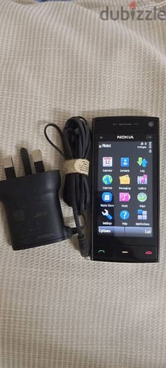 Nokia X6 Xpress music with original charger 15kd 0