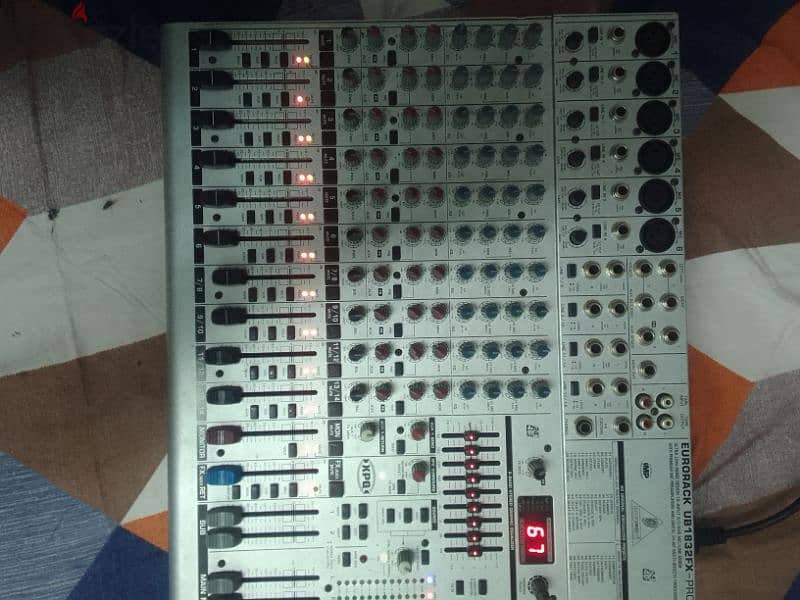 bheringer 14 chanel mixer . all chanell 100% working good . 5