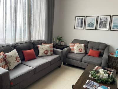 2 sofas from Ashley 2-seater and 3 seater ٢ كنب من اشلي