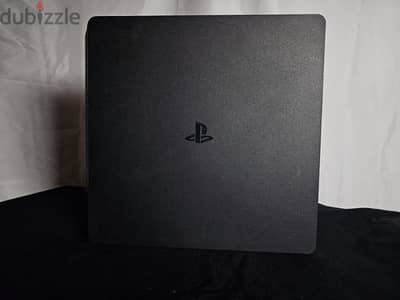 PlayStation 4 slim with two controllers