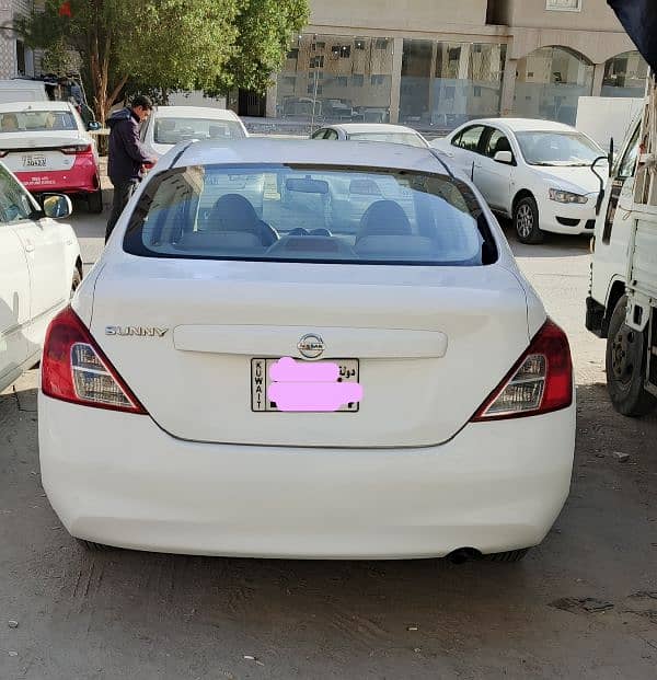 Nissan Sunny 2014 White 1