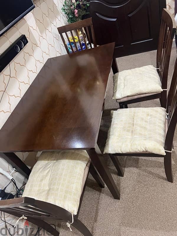 Dining table, storage drawers and swing chair with rug for sale 1