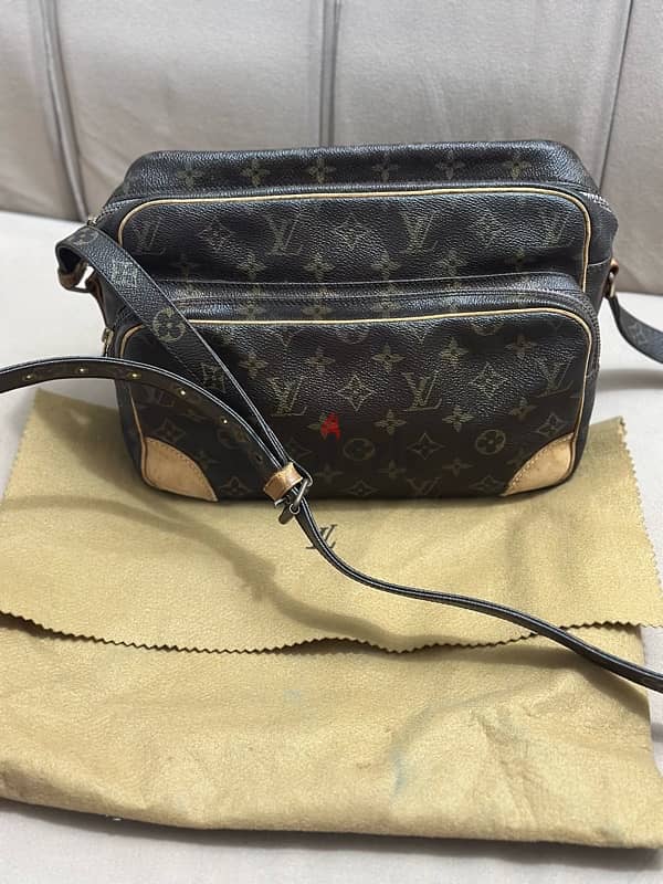 authentic louis vuitton nile bag 0