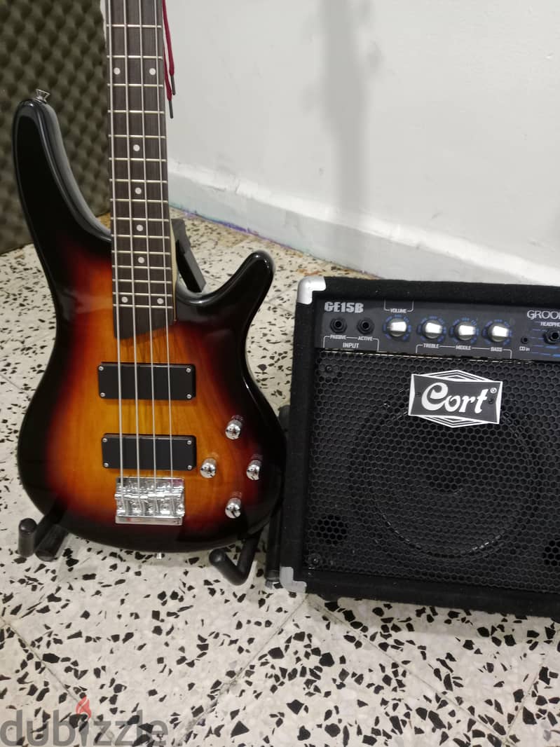 smiger bass guitar and cort bass amp. 0