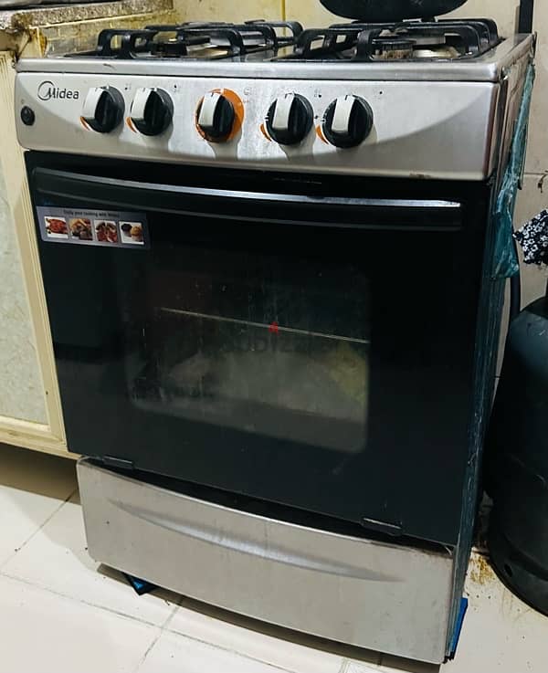 Daewoo microwave oven, Black and decker Oven grill,Midea Cooking range 1