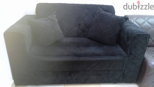 2 seater sofa in good condition with two pillows