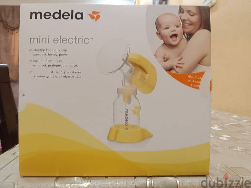 Medela electric breast pump and pigeon manual breast pump 1