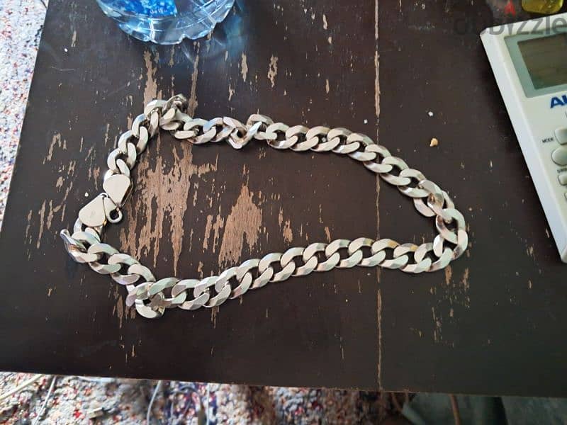 silver chain oriental (925 ) weight  ( 210 ) good condition need call 2