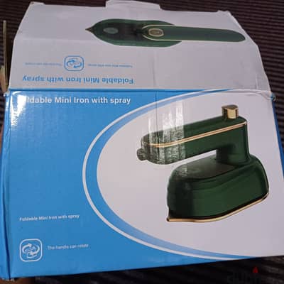 Steam Iron,  suitable for travel