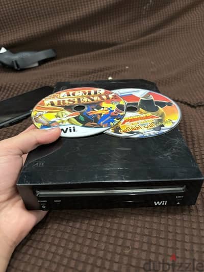 Black Nintendo Wii Console with 2 Games – Great Deal!