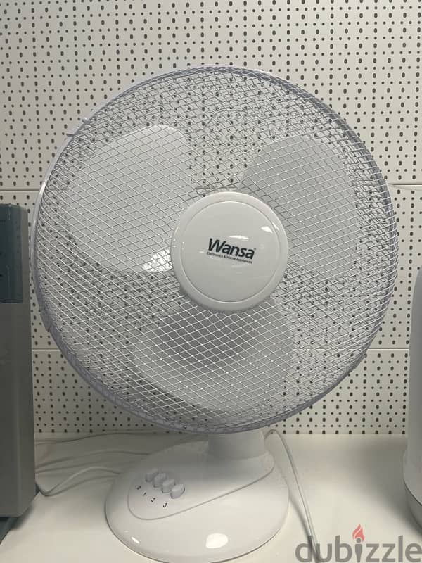 Wansa fan stand white and black color and stand fan from 6 kd new 9