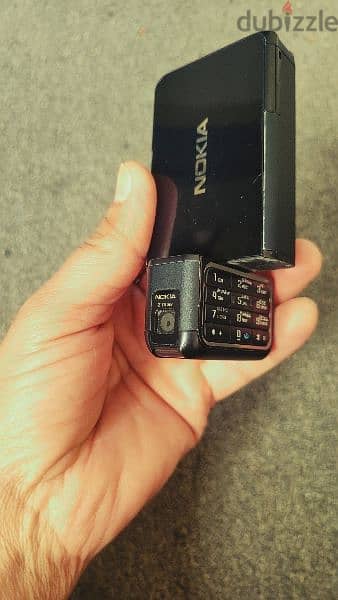 Nokia Model 3250 looks like new orginal sharger orginal battery strong 10