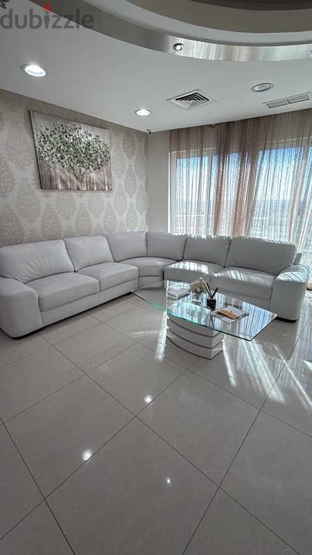 leather white sofa and 3nos individual sofas 0