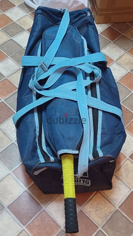 Cricket kit bag along with batting pads, helmet,gloves etc. 8