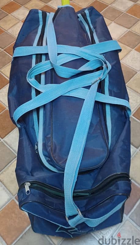 Cricket kit bag along with batting pads, helmet,gloves etc. 9