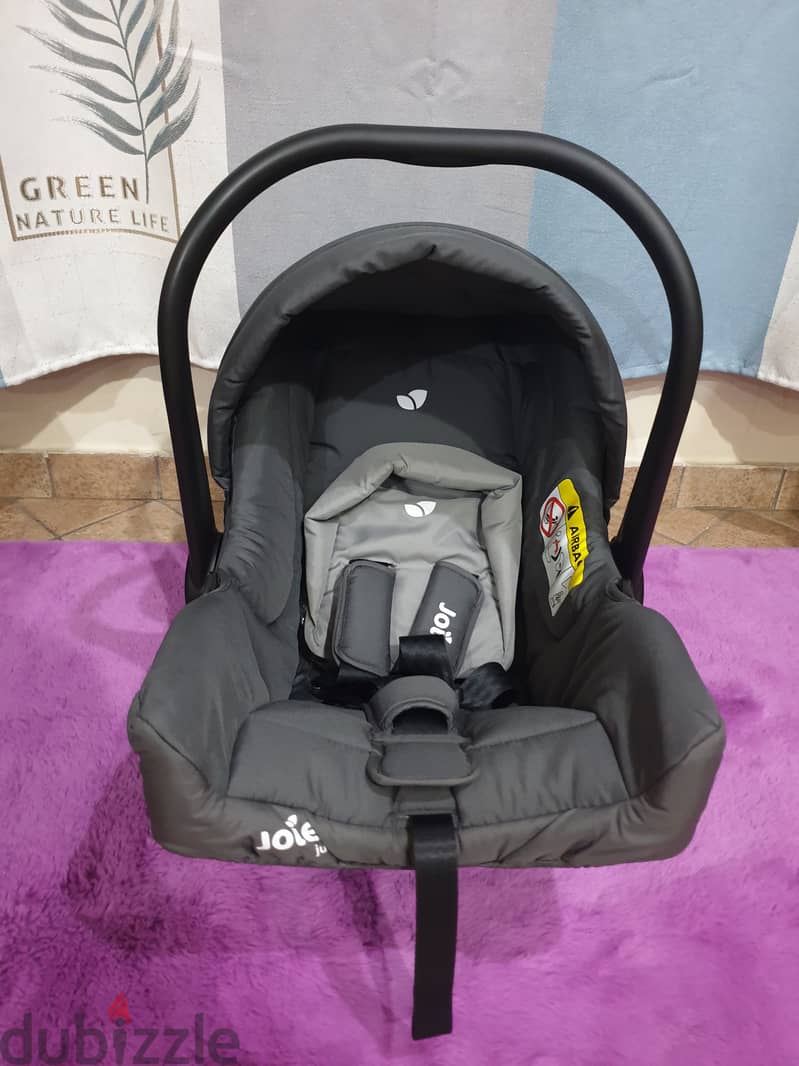 Brand new baby car seat, Brand - Joie 0