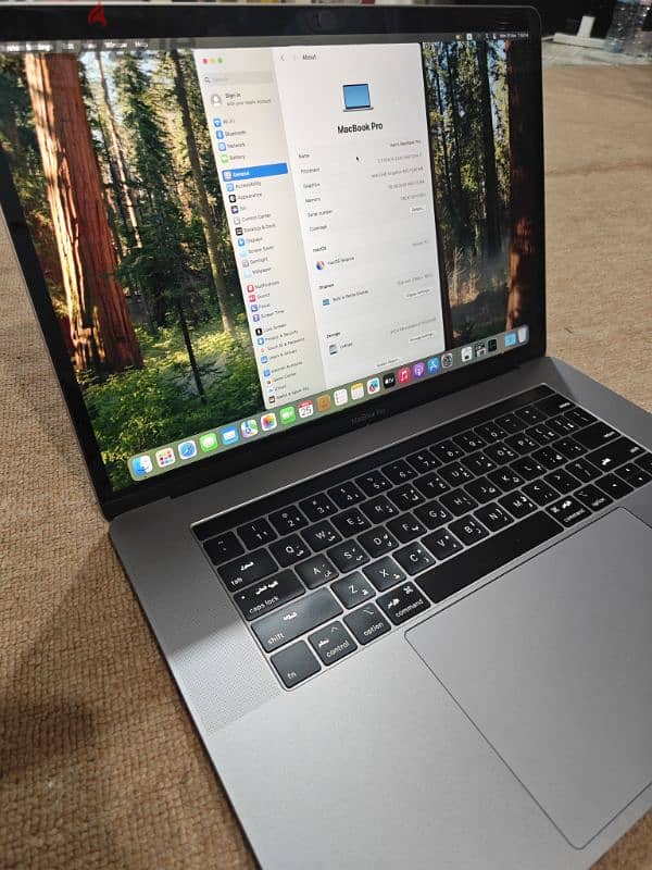 MacBook Pro i7 with 4GB Graphics & touch bar 1