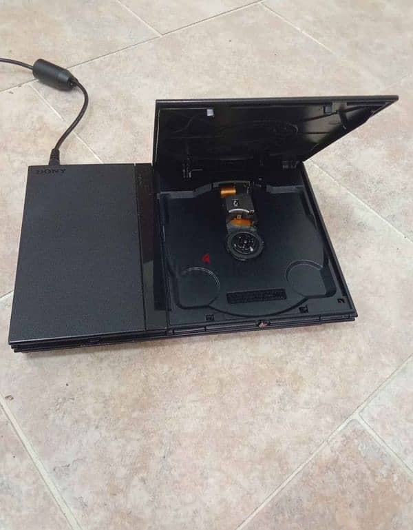 Playstation 2 with games and controller of sell or exchange 5