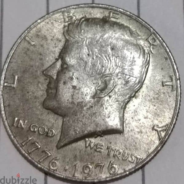 John Kennedy coin. . . . . . . عملة جون كينيدي 1