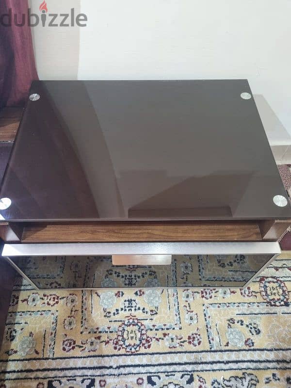 Glass topped wooden table 1