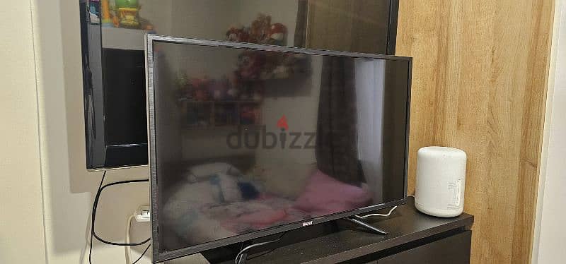 used LG 43 inch with smart box +used smart tv Wansa 32 inch 0