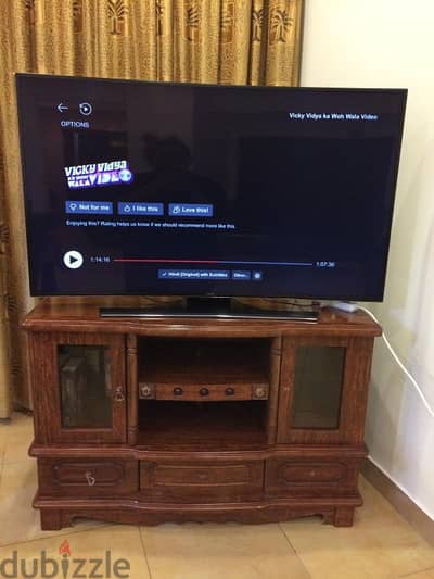 Samsung 55inch smart TV with wooden stand