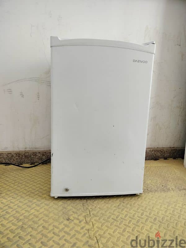 For sale, a small Daewoo refrigerator in excellent condition. 0