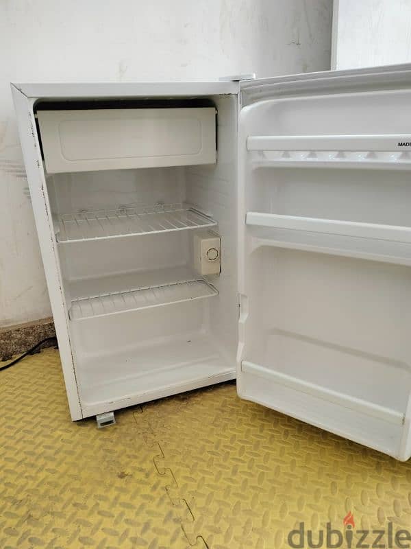 For sale, a small Daewoo refrigerator in excellent condition. 2