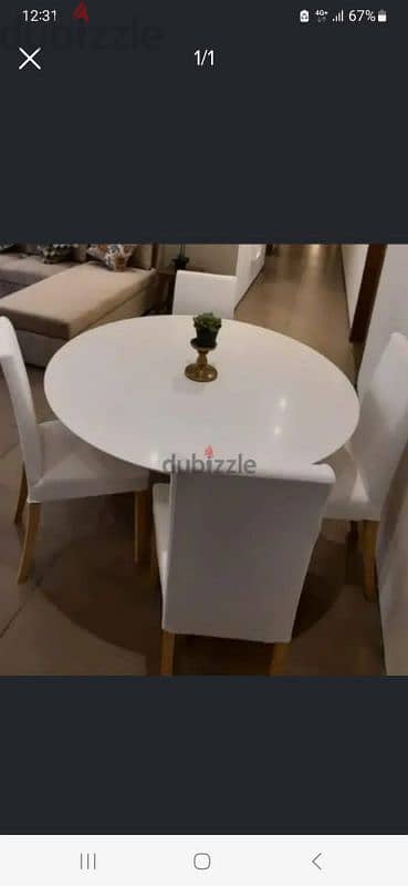 IKEA four seater round table with chairs 0