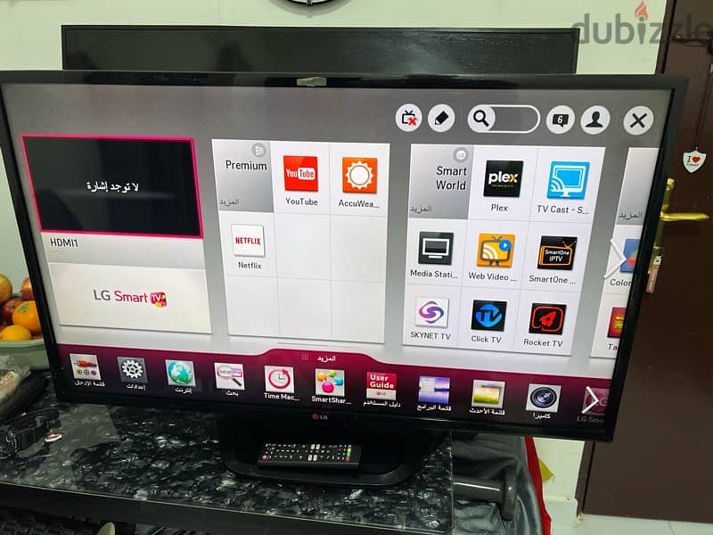 lg smart 43 inch with remote and stand perfect condition no scratches 0