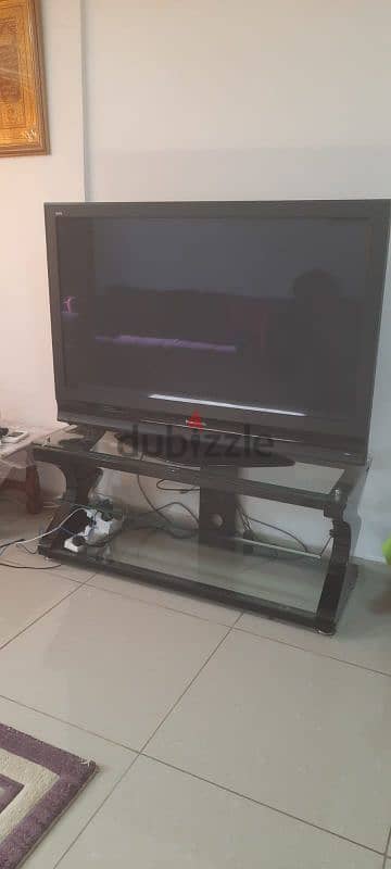 52 inches Panasonic T. V with glass tanle 0