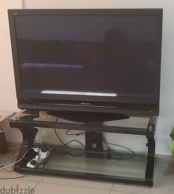 52 inches Panasonic T. V with glass tanle 1