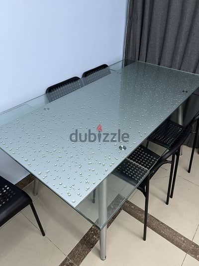 Stylish Glass Dining Table with Extendable Sides