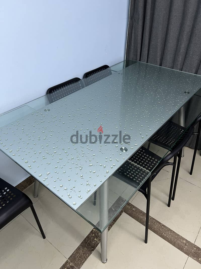 Stylish Glass Dining Table with Extendable Sides 0