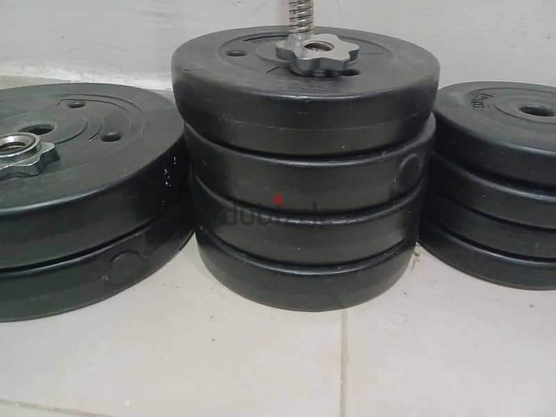 50 Kg weight training plates and barbell with lock 0