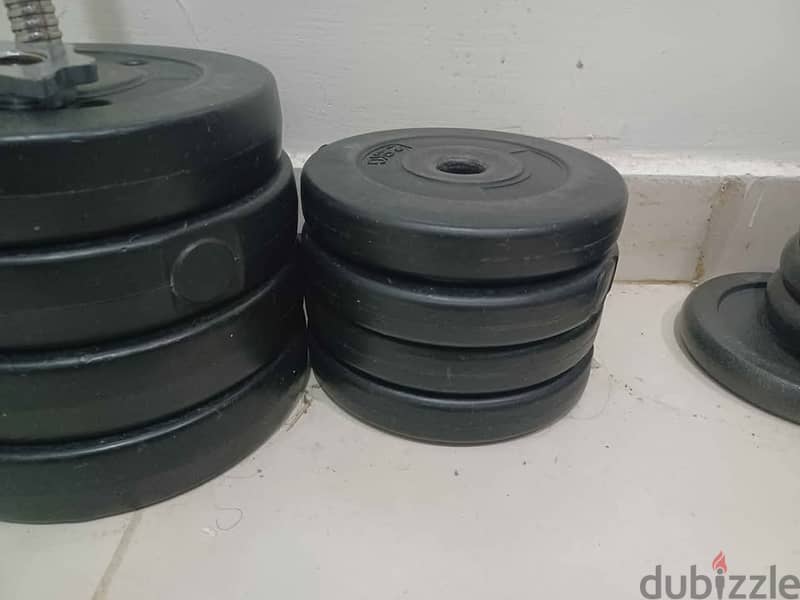 50 Kg weight training plates and barbell with lock 1