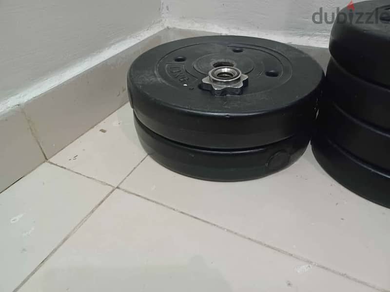 50 Kg weight training plates and barbell with lock 2