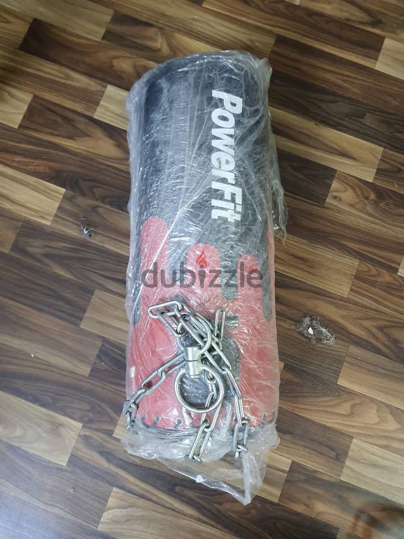 PUNCHING BAG AND ROLLER SKATES FOR SALE 0