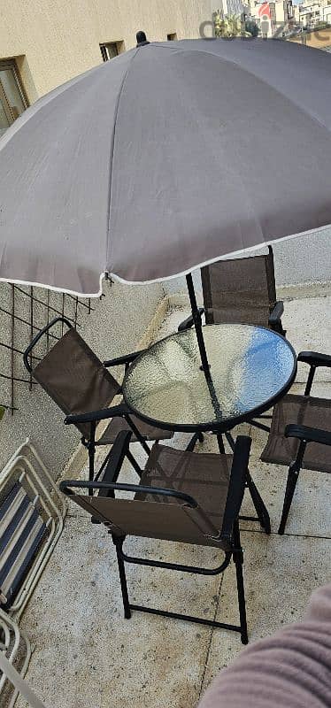 Outdoor Table Umbrella and chairs 0