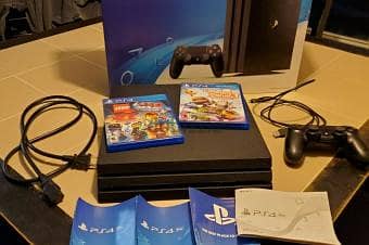 PlayStation 4 Pro 1TB + 2 Controller + 1 CD game Call of Duty + fifa25 1