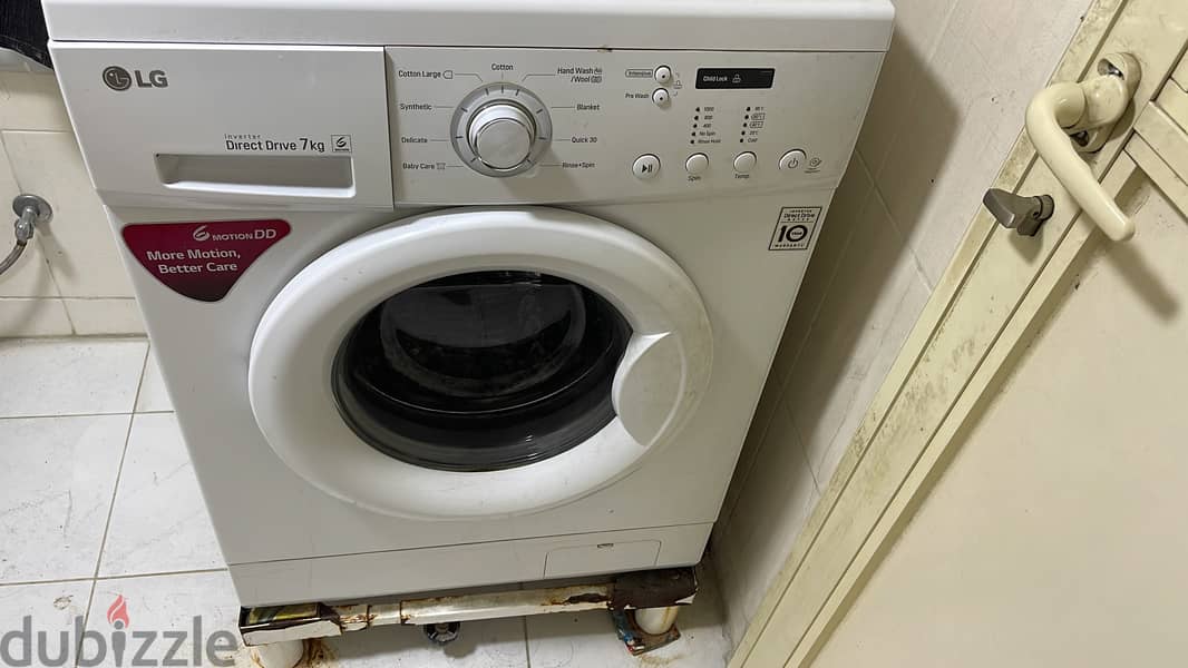 LG 7.0 kg front load washing machine sparingly used 0