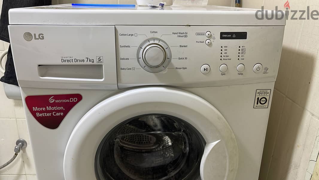 LG 7.0 kg front load washing machine sparingly used 1