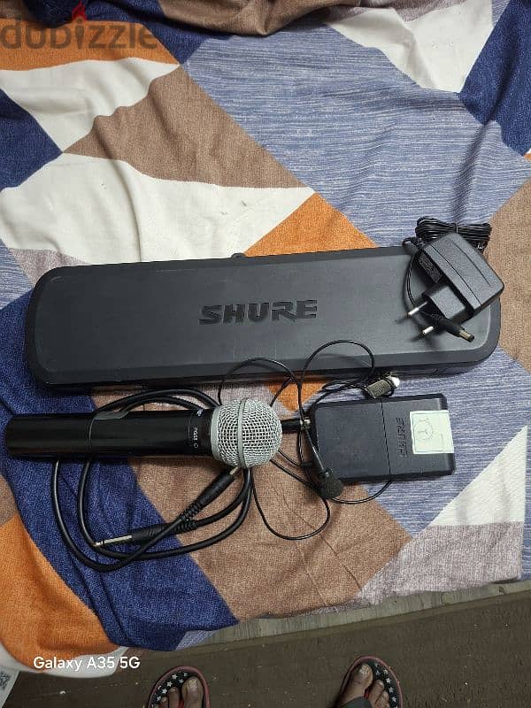 shure pg58 wireless microphone . 1