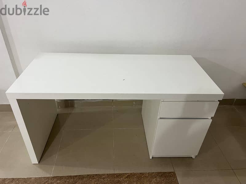 2. 	A WHITE COLOUR IKEA STUDY TABLE AND HOME CENTER SOFA CUM BED 3