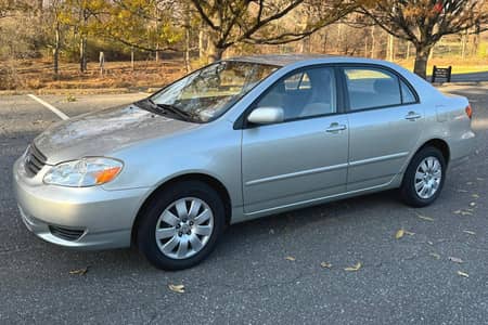 WhatsApp + 31 687 040 507 Toyota Corolla LE 2003