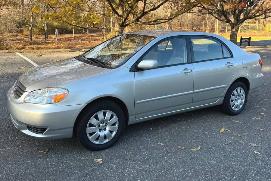 WhatsApp + 31 687 040 507 Toyota Corolla LE 2003 0